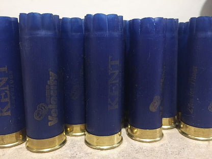 Navy blue Kent Velocity shotgun shells with gold bottoms showing fluted crimped tops