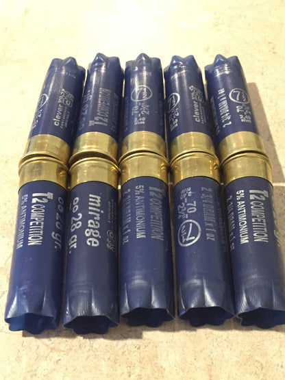 5 navy blue 12 gauge shotgun shells laid side by side, gold brass bases and hull text facing camera