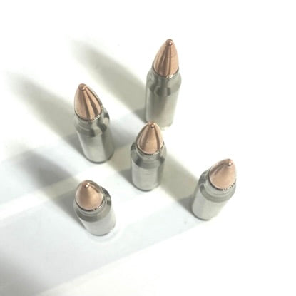Five nickel-plated .308/7.62x51 dummy cartridges viewed from above in a five-point cluster