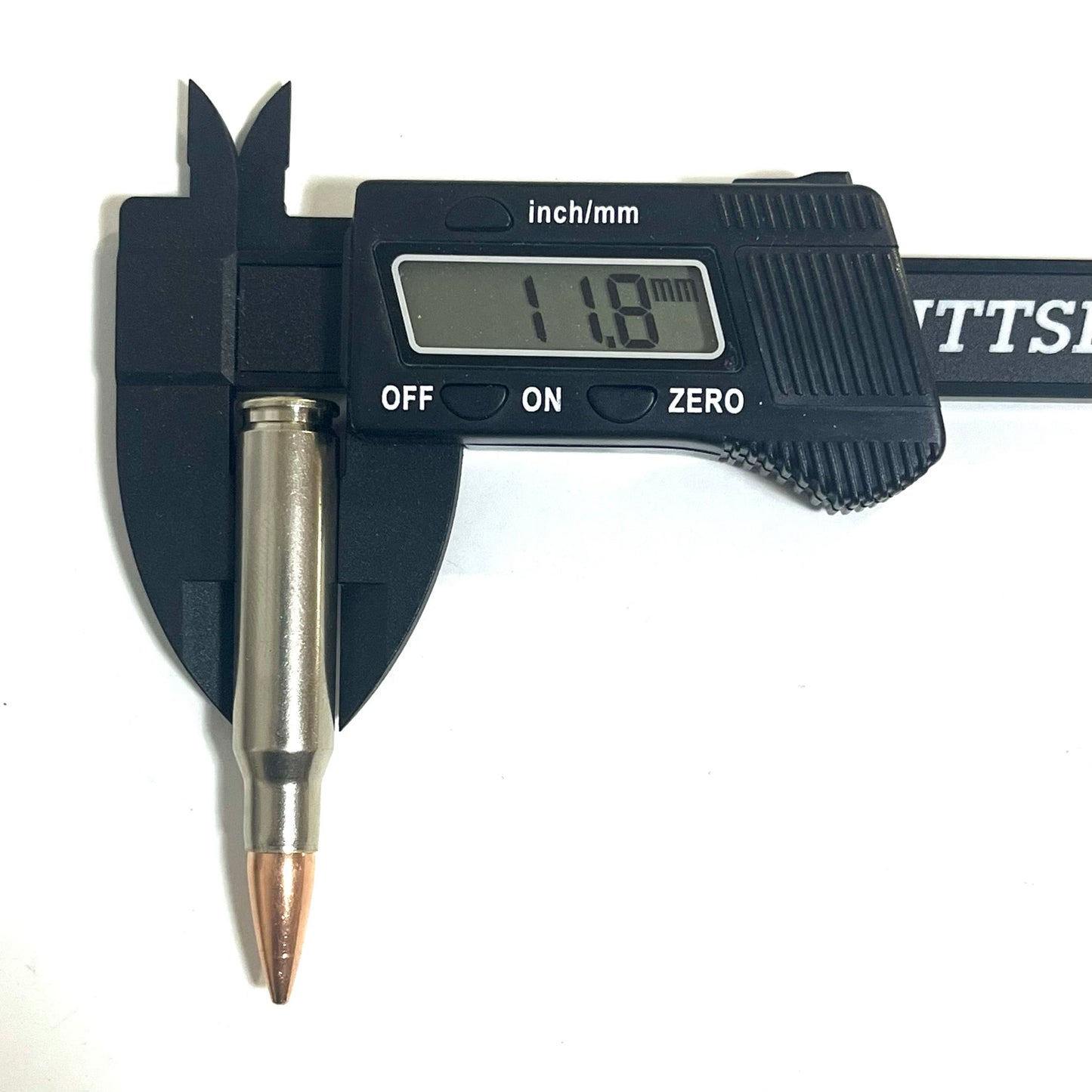 A single nickel-plated .308/7.62x51 dummy round measured vertically with calipers reading 11.8 mm