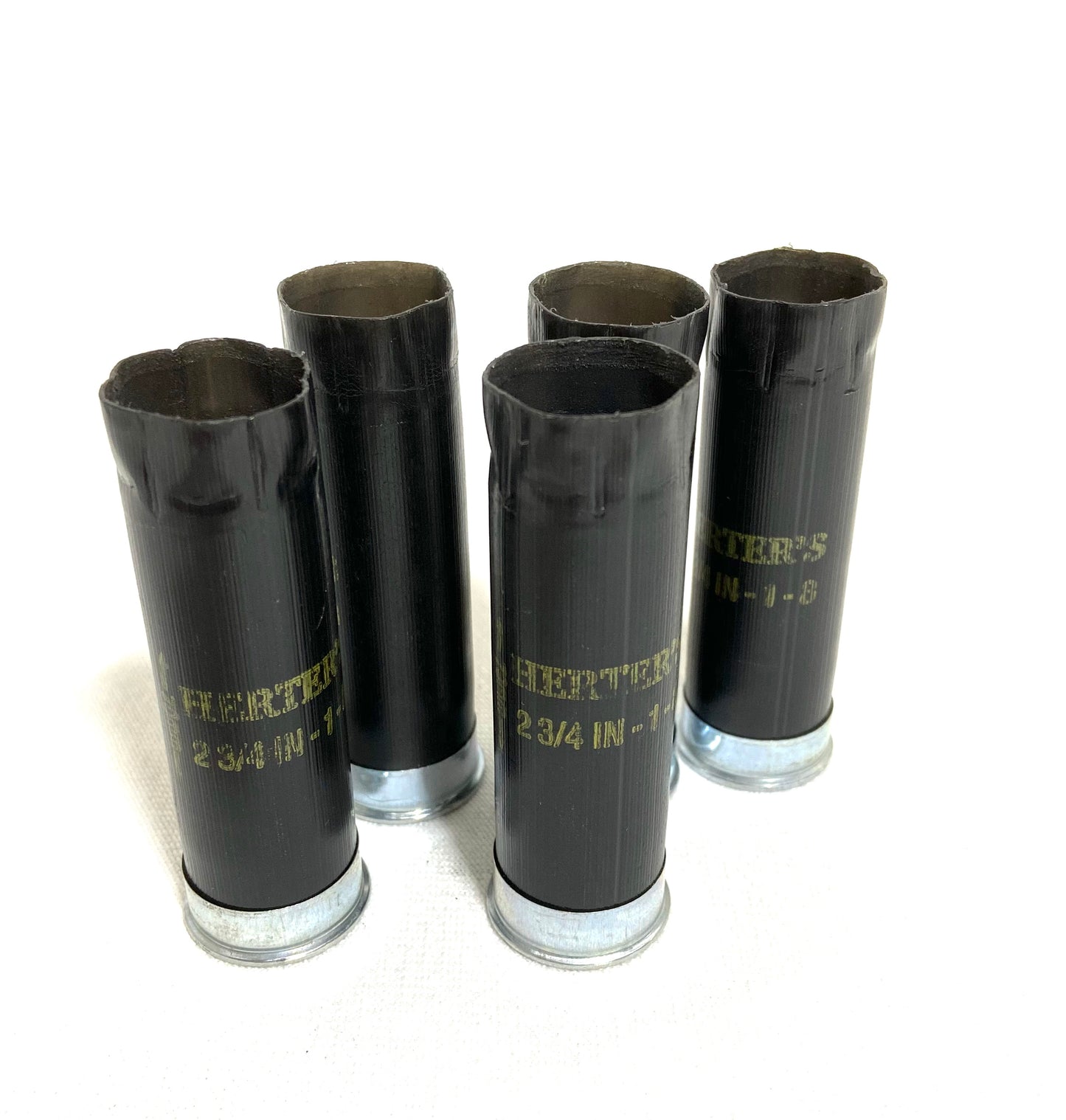Inert Empty black 12-gauge Herter's shotgun shells with silver bases and gold lettering for DIY ammo crafting.SHIPPING