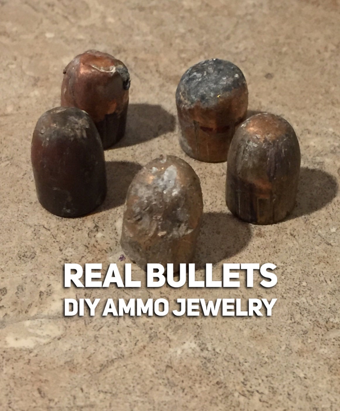 5 tarnished spent bullets standing upright on a stone surface, text reading REAL BULLETS DIY AMMO JEWELRY