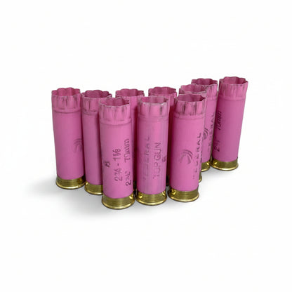 Nine pink Federal Top Gun shells standing upright with 8 star crimped tops, white background.