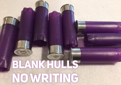 Purple empty 12-gauge shotgun shell hulls with text reading “Blank hulls, no writing”