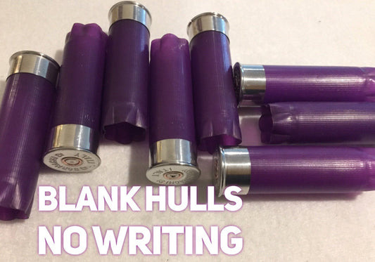 Purple empty 12-gauge shotgun shell hulls with text reading “Blank hulls, no writing”
