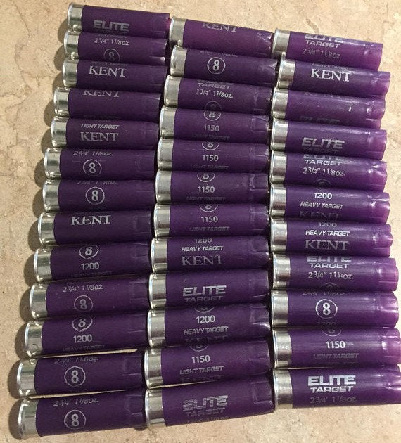 Grid of purple Kent Elite Target 12 gauge shotgun shells showing printed load specifications