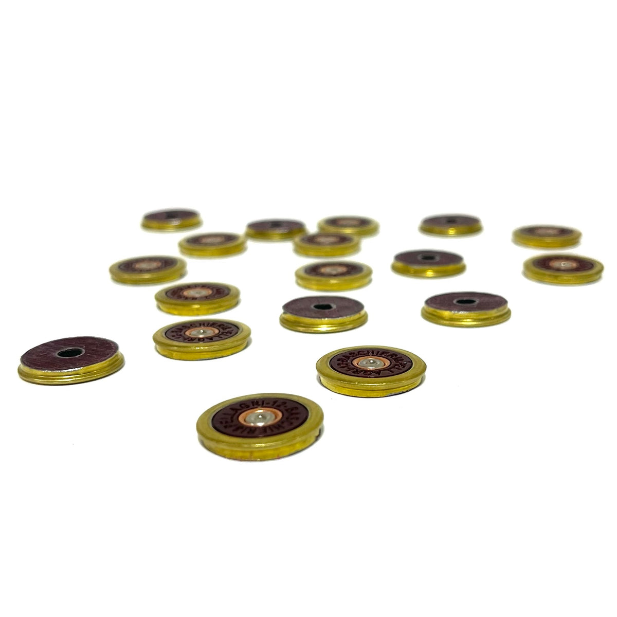 17 Baschieri and Pellagri 12 GA red shotgun shell slices with brass rims on a dark background