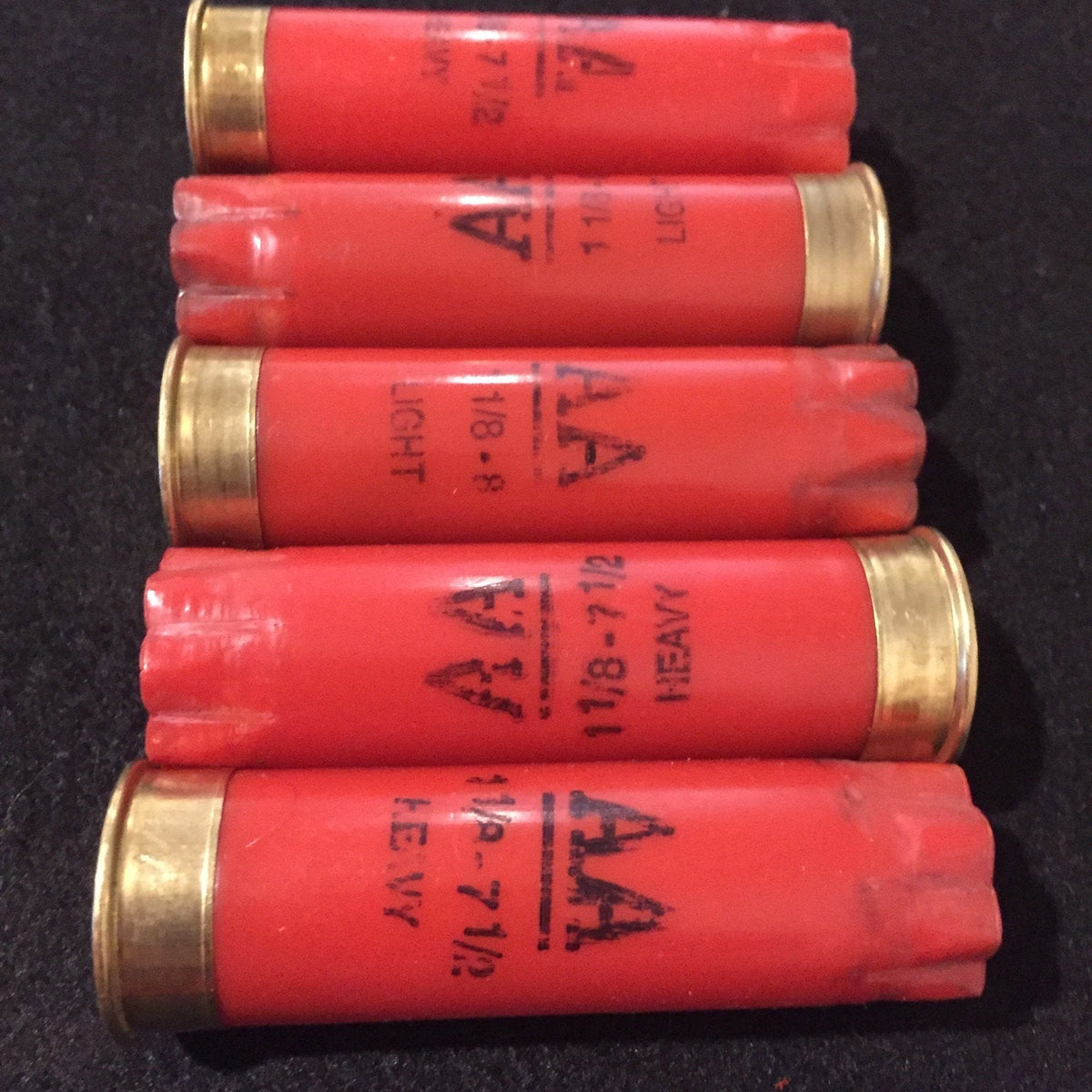 Red Winchester AA 12 Gauge Hulls Stacked Together