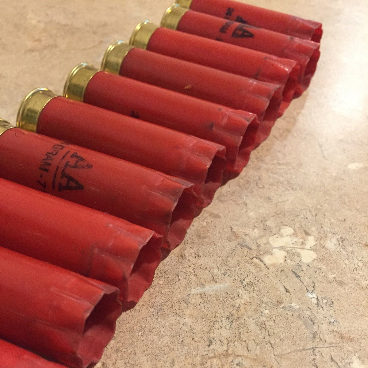 Diagonal Row Of Red Winchester AA 12 Gauge spent Hulls