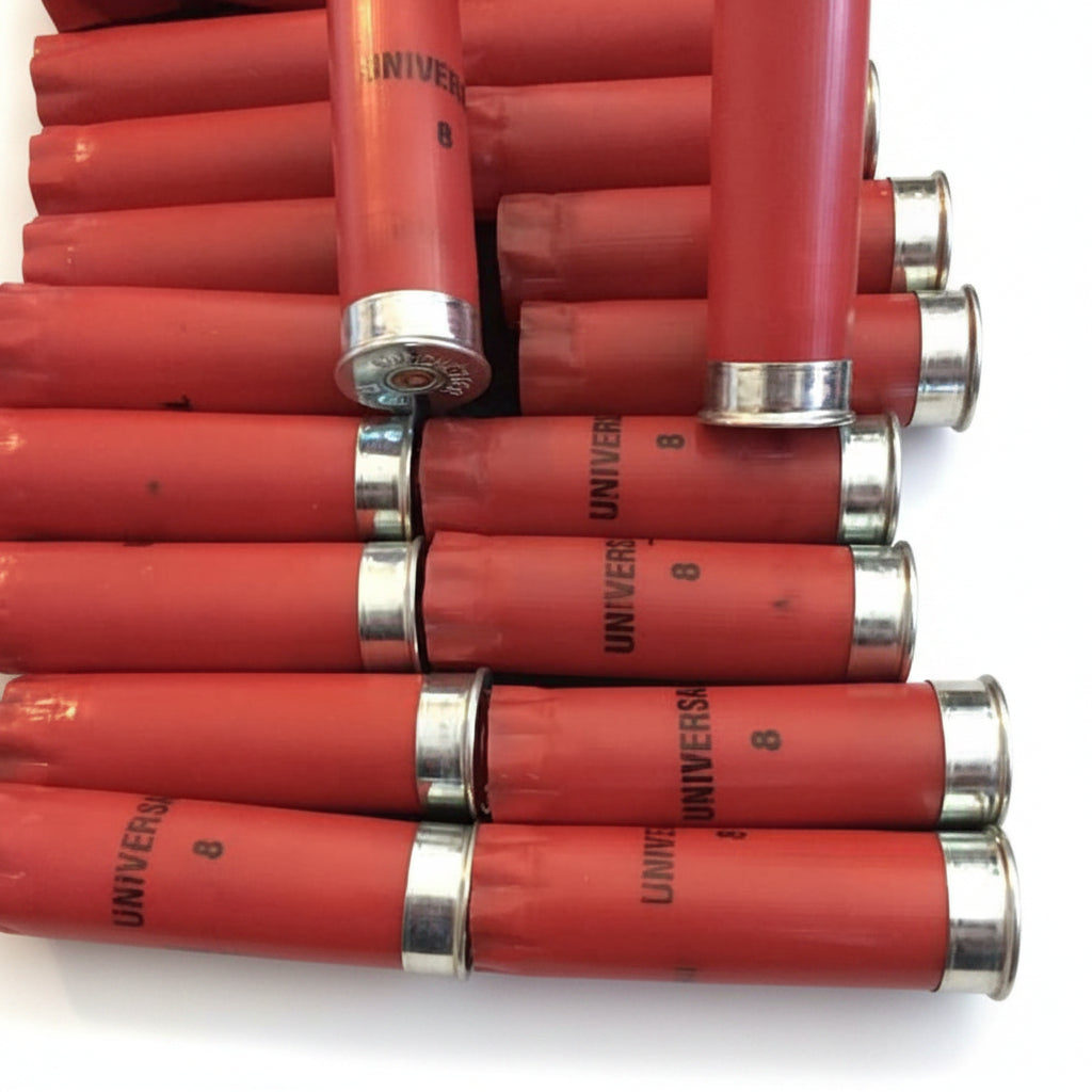 Red Winchester Universal 12 Gauge Fired Hulls In A Diagonal Pile