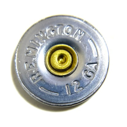 Close-up of a single Remington 12 gauge bullet slice showing the embossed "REMINGTON 12 GA" headstamp and brass primer