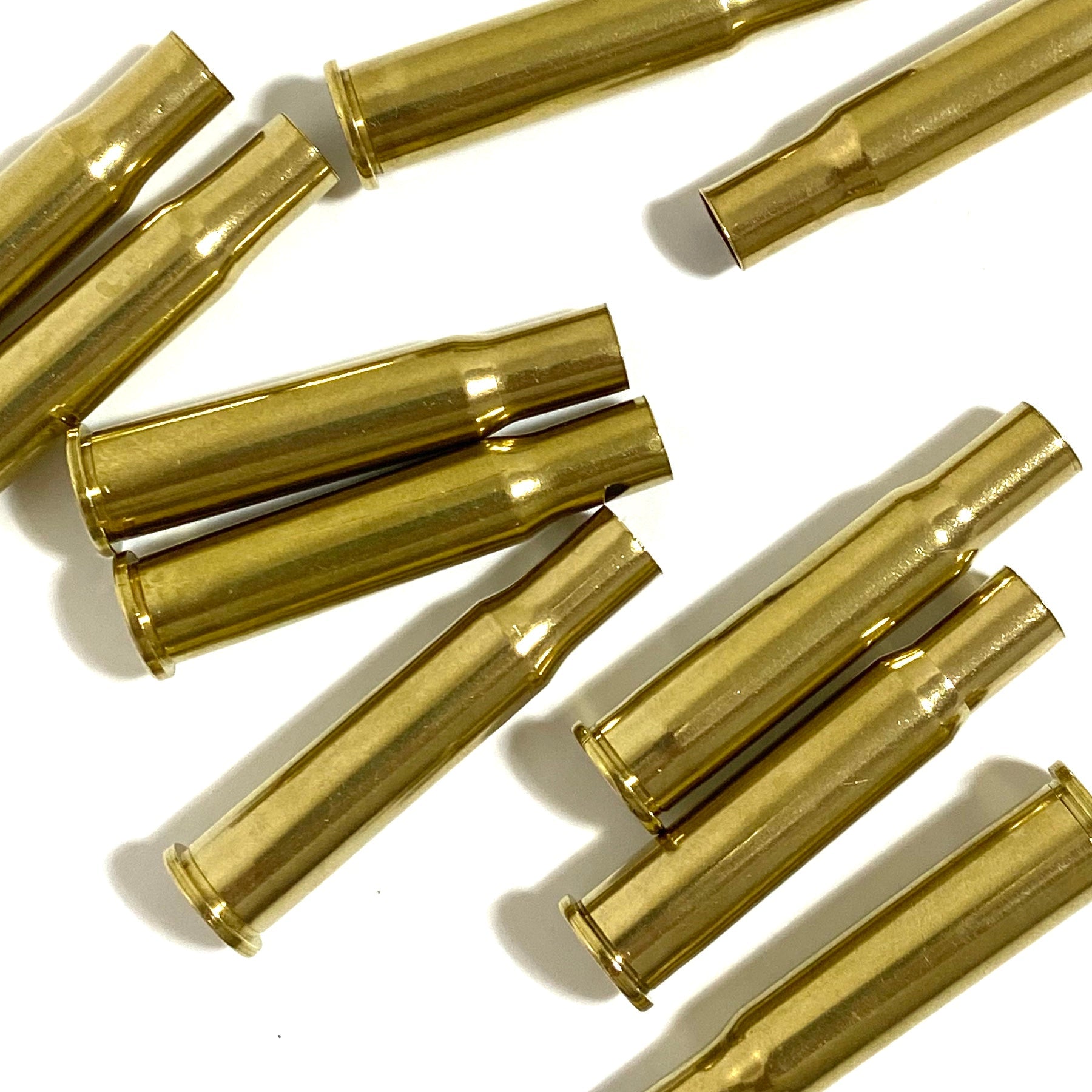 Polished 30-30 Winchester brass casings for resin casting props and steampunk art, tumbled gold empty shells.
