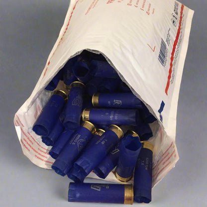 Bulk used blue RIO 12ga shotgun shells packaged in a padded shipping mailer for safe delivery