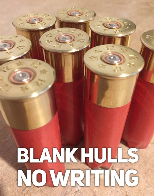 7 salmon pink Fiocchi 12 gauge paper shotgun shells with gold brass heads, text reading BLANK HULLS NO WRITING