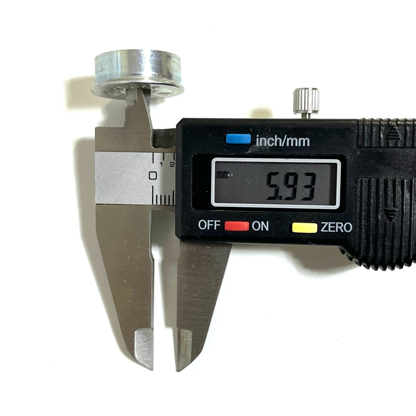 Digital caliper measuring the height of a silver Winchester 12 gauge deprimed steel bottom, reading 5.93mm