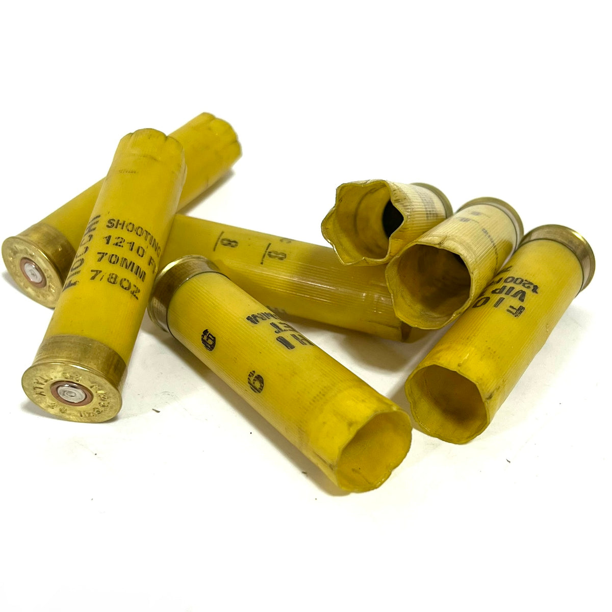 Yellow Fiocchi shotshells printed with "SHOOTING 1210" and "70MM 7/8 OZ" load markings.